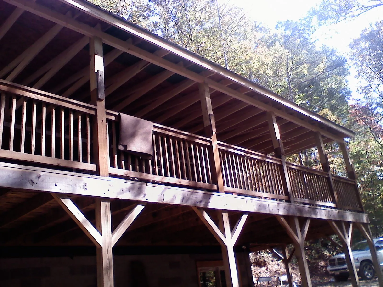 Timber framing under a new elevated porch and deck — Roof Leak Repair in Moscow Mills by Roofing Brothers
